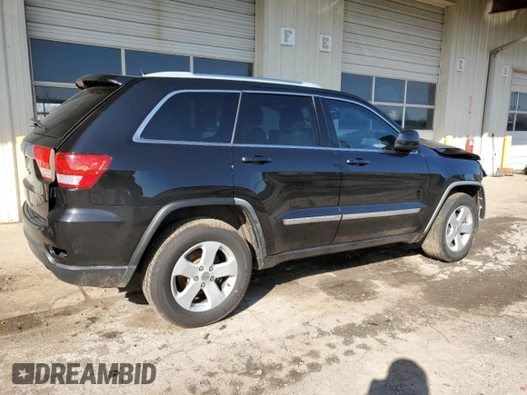 2012 Jeep Grand Cherokee Laredo with VIN 1C4RJEAG2CC215525, listed as a Copart auction lot 51876105 with 148,659 mi miles and Salvage Title. Bid and sale history available at carsss.com. Image 3.