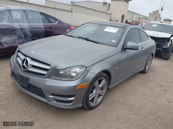 2012 Mercedes-Benz C-Class C 250 with VIN WDDGJ4HB6CF864731, listed as a IAAI auction lot 41177482 with 134,642 mi miles. Bid and sale history available at carsss.com. Image 2.