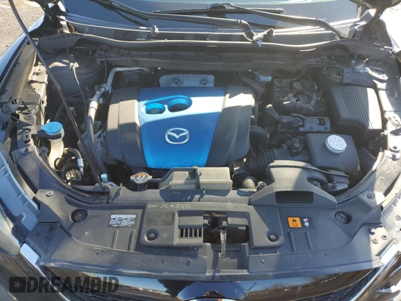2013 Mazda CX-5 Grand Touring with VIN JM3KE4DE5D0168253, listed as a Copart auction lot 52112935 with 143,375 mi miles and Salvage Title. Bid and sale history available at carsss.com. Image 12.