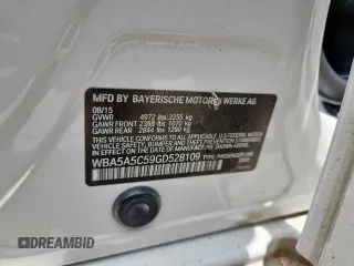 2016 BMW 5 Series 528i with VIN WBA5A5C59GD528109, listed as a Copart auction lot 61691405 with 107,837 mi miles and Salvage title. Bid and sale history available at DreamBid. Image 12.
