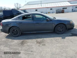 2008 Pontiac Grand Prix z VIN 2G2WP552281113384, wystawiony jako IAAI lot #41989008 z przebiegiem 242 354 mil mil oraz . Historia ofert i sprzedaży dostępna na DreamBid. Obrazek 13.
