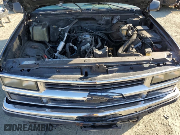 1998 Chevrolet Tahoe z VIN 3GNEK18R9WG123185, wystawiony jako Copart lot #53020915 z przebiegiem 310 261 mil mil oraz Nie do naprawy • Non repairable. Historia ofert i sprzedaży dostępna na DreamBid. Obrazek 12.