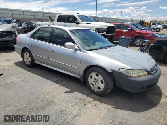 2002 Honda Accord EX z VIN 1HGCG16572A069123, wystawiony jako Copart lot #55861375 z przebiegiem 117 455 mil mil oraz Szkoda całkowita • Salvage title. Historia ofert i sprzedaży dostępna na DreamBid. Obrazek 4.