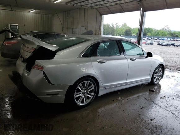 2015 Lincoln MKZ z VIN 3LN6L2GK4FR613117, wystawiony jako Copart lot #54141735 z przebiegiem 129 072 mil mil oraz Szkoda całkowita • Salvage title. Historia ofert i sprzedaży dostępna na DreamBid. Obrazek 3.