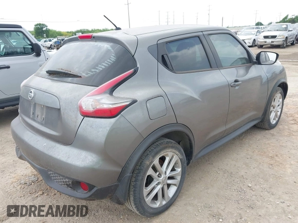 2015 Nissan Juke S with VIN JN8AF5MR8FT512769, listed as a IAAI auction lot 42102306 with 74,952 mi miles. Bid and sale history available at carsss.com. Image 4.