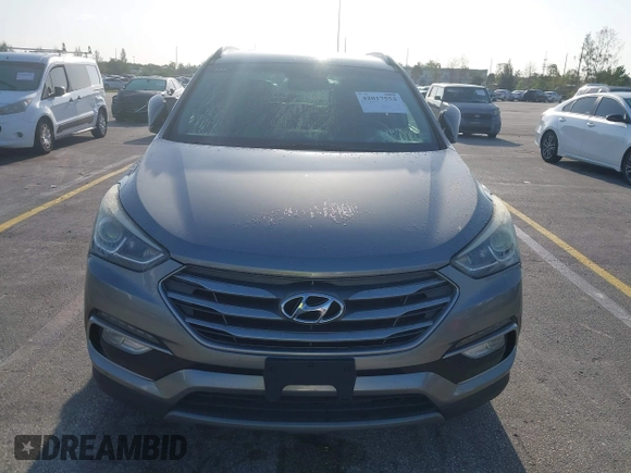 2017 Hyundai Santa Fe 2.4L z VIN 5XYZU3LB0HG420910, wystawiony jako IAAI lot #42017552 z przebiegiem 184 666 mil mil oraz . Historia ofert i sprzedaży dostępna na DreamBid. Obrazek 6.