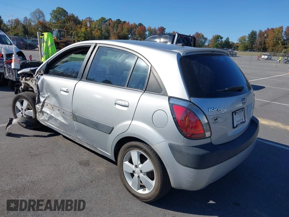 2009 Kia Rio LX with VIN KNADE243696547512, listed as a IAAI auction lot 40639932 with 204,809 mi miles. Bid and sale history available at carsss.com. Image 3.