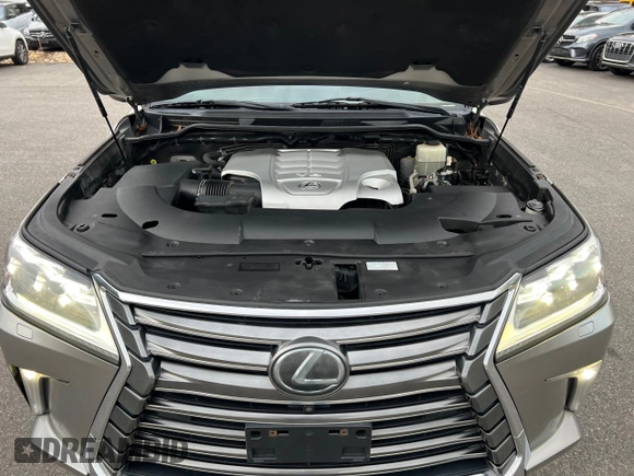 2016 Lexus LX 570 with VIN JTJHY7AX7G4203810, listed as a Copart auction lot 86017494 with 296,703 mi miles and Clean Title. Bid and sale history available at DreamBid. Image 8.
