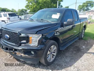 2018 Ford F-150 XL with VIN 1FTEX1CPXJKE63642, listed as a IAAI auction lot 42768090 with 147,219 mi miles and . Bid and sale history available at DreamBid. Image 17.