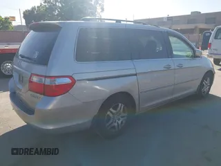 2005 Honda Odyssey EX-L z VIN 5FNRL38635B416982, wystawiony jako IAAI lot #42337383 z przebiegiem 350 647 mil mil oraz . Historia ofert i sprzedaży dostępna na DreamBid. Obrazek 4.
