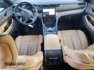 2023 Jeep Grand Cherokee Summit Reserve with VIN 1C4RJKEG8P8723399, listed as a Copart auction lot 51033365 with 32,689 mi miles and Salvage title. Bid and sale history available at DreamBid. Image 8.