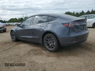 2023 Tesla Model 3 with VIN 5YJ3E1EA3PF672023, listed as a Copart auction lot 57571645 with 18,115 mi miles and Salvage title. Bid and sale history available at DreamBid. Image 2.