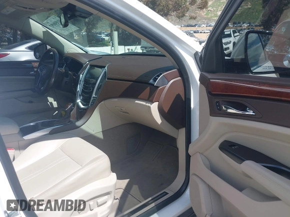 2015 Cadillac SRX Luxury Collection with VIN 3GYFNBE38FS584296, listed as a IAAI auction lot 41950092 with 56,691 mi miles and . Bid and sale history available at carsss.com. Image 5.