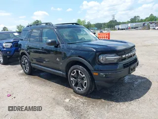 2023 Ford Bronco Sport Outer Banks z VIN 3FMCR9C64PRD53239, wystawiony jako IAAI lot #42128367 z przebiegiem 19 219 mil mil oraz . Historia ofert i sprzedaży dostępna na DreamBid. Obrazek 1.
