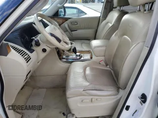 2012 Infiniti QX56 8-passenger z VIN JN8AZ2NC3C9317364, wystawiony jako Copart lot #49665145 z przebiegiem 228 371 mil mil oraz Czysty tytuł • Clean title. Historia ofert i sprzedaży dostępna na DreamBid. Obrazek 7.
