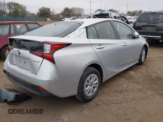 2022 Toyota Prius L Eco with VIN JTDKAMFU9N3185999, listed as a IAAI auction lot 41428106 with 50,798 mi miles. Bid and sale history available at carsss.com. Image 4.