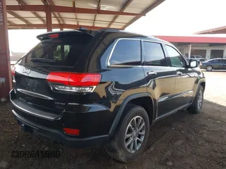 2014 Jeep Grand Cherokee Limited z VIN 1C4RJFBM9EC409093, wystawiony jako IAAI lot #42255242 z przebiegiem 121 059 mil mil oraz . Historia ofert i sprzedaży dostępna na DreamBid. Obrazek 4.