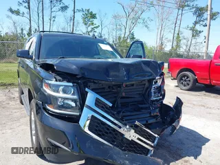 2020 Chevrolet Tahoe LT with VIN 1GNSKBKC3LR176828, listed as a IAAI auction lot 41781047 with 62,840 mi miles and . Bid and sale history available at DreamBid. Image 6.