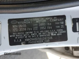 2006 Hyundai Elantra GLS z VIN KMHDN46D56U241506, wystawiony jako Copart lot #52397355 z przebiegiem 128 522 mil mil oraz Szkody całkowita. Historia ofert i sprzedaży dostępna na DreamBid. Obrazek 14.