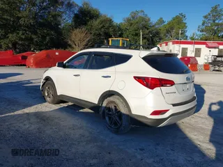2017 Hyundai Santa Fe 2.4L z VIN 5XYZU3LB4HG435992, wystawiony jako IAAI lot #40927607 z przebiegiem 104 868 mil mil oraz . Historia ofert i sprzedaży dostępna na DreamBid. Obrazek 3.