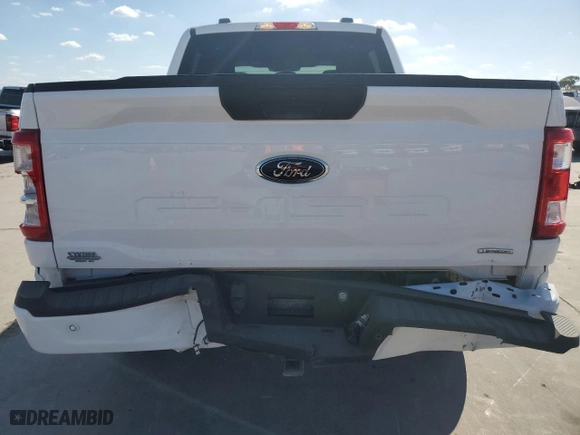 2021 Ford F-150 XL with VIN 1FTEW1C89MKE55077, listed as a Copart auction lot 77783054 with 32,935 mi miles and Salvage Title. Bid and sale history available at carsss.com. Image 6.
