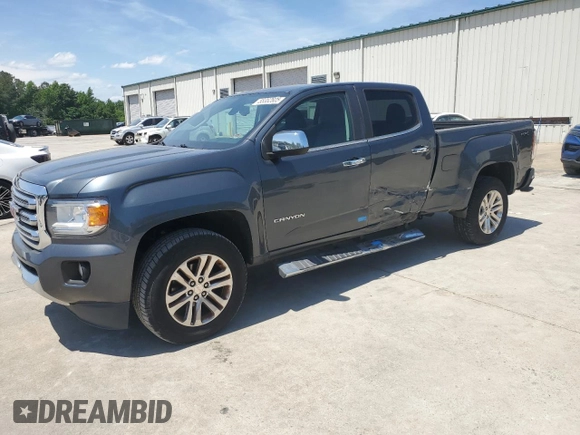 2015 GMC Canyon 4WD SLT z VIN 1GTG6CE30F1182562, wystawiony jako Copart lot #55382605 z przebiegiem 97 183 mil mil oraz Szkoda całkowita • Salvage title. Historia ofert i sprzedaży dostępna na DreamBid. Obrazek 1.