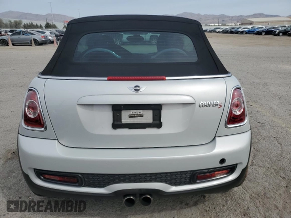 2014 MINI Convertible S with VIN WMWZP3C53ET707205, listed as a Copart auction lot 52179175 with 101,209 mi miles and Salvage Title. Bid and sale history available at DreamBid. Image 6.