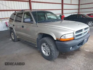 2002 Dodge Durango SLT z VIN 1B4HS48N92F141070, wystawiony jako IAAI lot #41878553 z przebiegiem 206 887 mil mil oraz . Historia ofert i sprzedaży dostępna na DreamBid. Obrazek 1.