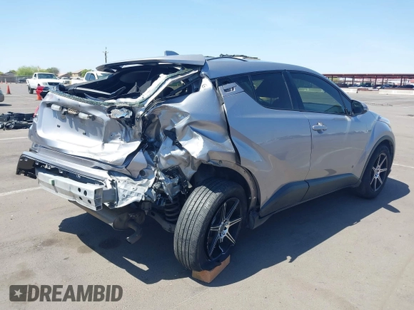 2020 Toyota C-HR LE with VIN JTNKHMBX4L1088502, listed as a IAAI auction lot 41982312 with 69,160 mi miles and . Bid and sale history available at DreamBid. Image 4.