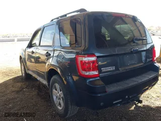2008 Ford Escape Hybrid with VIN 1FMCU49HX8KB90001, listed as a IAAI auction lot 41558762 with 200,677 mi miles. Bid and sale history available at carsss.com. Image 3.