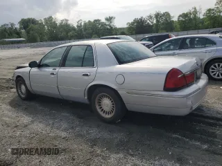 2001 Mercury Grand Marquis LS z VIN 2MEFM75W31X704781, wystawiony jako Copart lot #54613735 z przebiegiem 191 323 mil mil oraz Szkody całkowita. Historia ofert i sprzedaży dostępna na DreamBid. Obrazek 2.