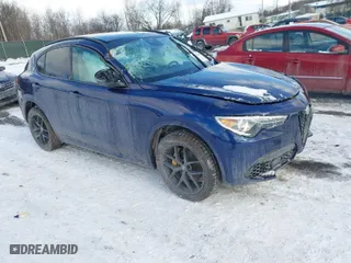 2021 Alfa Romeo Stelvio Ti with VIN ZASPAKBN1M7D09433, listed as a IAAI auction lot 41378468 with 31,717 mi miles. Bid and sale history available at carsss.com. Image 1.