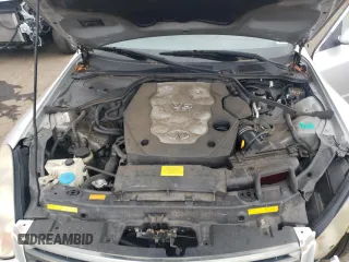 2006 Infiniti G35 z VIN JNKCV51F26M616815, wystawiony jako Copart lot #57521415 z przebiegiem 115 490 mil mil oraz Szkoda całkowita • Salvage title. Historia ofert i sprzedaży dostępna na DreamBid. Obrazek 11.