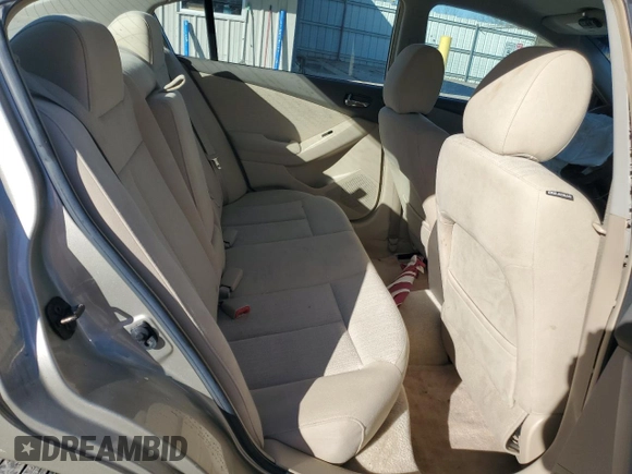 2010 Nissan Altima 2.5 S with VIN 1N4AL2AP9AC172584, listed as a Copart auction lot 83541234 with 124,004 mi miles and Salvage Title. Bid and sale history available at carsss.com. Image 10.