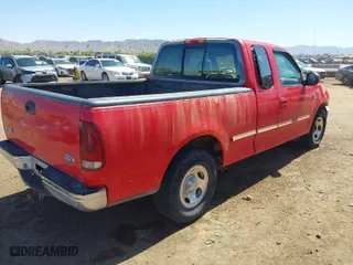 1997 Ford F-150 Standard with VIN 1FTDX176XVKA31331, listed as a IAAI auction lot 41977163 with 236,400 mi miles. Bid and sale history available at carsss.com. Image 4.