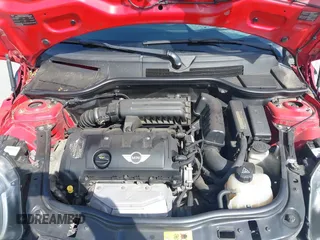 2012 MINI Coupe z VIN WMWSX1C56CT163981, wystawiony jako IAAI lot #42286576 z przebiegiem 131 955 mil mil oraz . Historia ofert i sprzedaży dostępna na DreamBid. Obrazek 10.