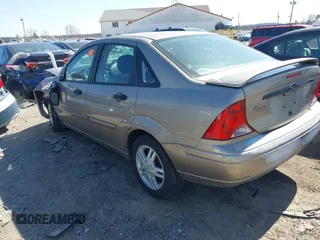 2003 Ford Focus SE with VIN 1FAFP34P03W240199, listed as a IAAI auction lot 41757940 with 91,852 mi miles and . Bid and sale history available at carsss.com. Image 3.