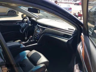 2013 Cadillac XTS Luxury z VIN 2G61P5S30D9220113, wystawiony jako IAAI lot #41970214 z przebiegiem 52 476 mil mil oraz . Historia ofert i sprzedaży dostępna na DreamBid. Obrazek 5.