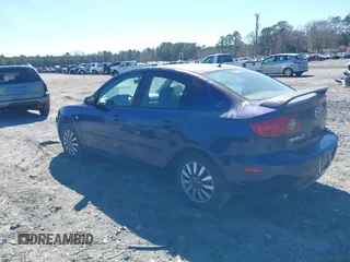 2006 Mazda 3 i Touring with VIN JM1BK32F561494865, listed as a IAAI auction lot 41637307 with 157,317 mi miles and . Bid and sale history available at DreamBid. Image 3.