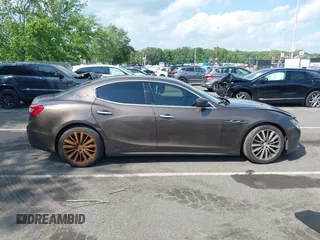 2015 Maserati Ghibli S Q4 with VIN ZAM57RTA7F1154097, listed as a IAAI auction lot 42568564 with 113,436 mi miles and . Bid and sale history available at DreamBid. Image 12.