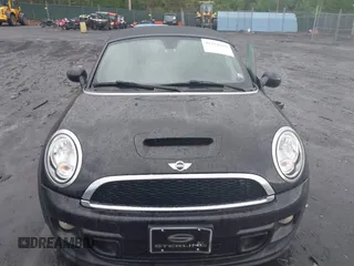 2013 MINI Roadster S z VIN WMWSY3C50DT566042, wystawiony jako IAAI lot #42264418 z przebiegiem 84 762 mil mil oraz . Historia ofert i sprzedaży dostępna na DreamBid. Obrazek 12.