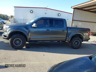 2020 Ford F-150 Raptor with VIN 1FTFW1RG5LFA62445, listed as a IAAI auction lot 41811982 with 95,947 mi miles and . Bid and sale history available at carsss.com. Image 14.