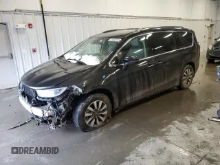 2021 Chrysler Pacifica Hybrid Touring L with VIN 2C4RC1L72MR577010, listed as a Copart auction lot 51046155 with 76,853 mi miles and Salvage title. Bid and sale history available at DreamBid. Image 1.
