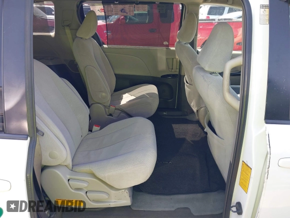 2014 Toyota Sienna LE with VIN 5TDJK3DC5ES081232, listed as a IAAI auction lot 41789629 with 397,033 mi miles and . Bid and sale history available at DreamBid. Image 8.