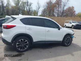 2016 Mazda CX-5 Grand Touring with VIN JM3KE4DY6G0618121, listed as a IAAI auction lot 41958805 with 101,232 mi miles. Bid and sale history available at carsss.com. Image 14.