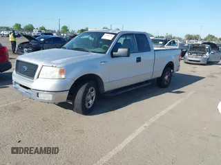 2004 Ford F-150 XL with VIN 1FTPX12594NA32477, listed as a IAAI auction lot 42088113 with 266,389 mi miles. Bid and sale history available at carsss.com. Image 2.