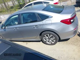2024 Honda Civic LX z VIN 2HGFE2F25RH568111, wystawiony jako IAAI lot #41982920 z przebiegiem 20 286 mil mil oraz . Historia ofert i sprzedaży dostępna na DreamBid. Obrazek 14.