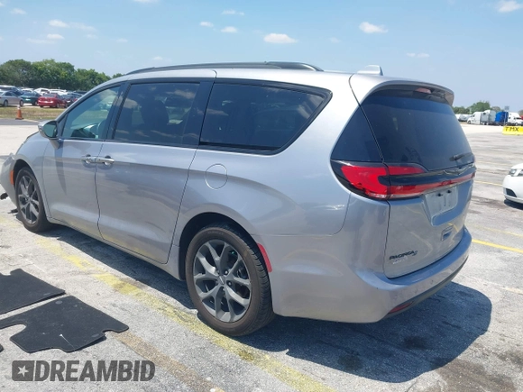 2021 Chrysler Pacifica Touring L with VIN 2C4RC1BG3MR591256, listed as a IAAI auction lot 42062406 with 58,117 mi miles and . Bid and sale history available at DreamBid. Image 3.