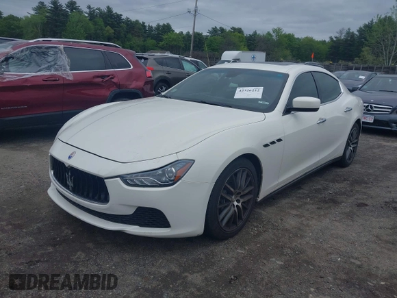 2014 Maserati Ghibli S Q4 with VIN ZAM57RTA6E1090505, listed as a IAAI auction lot 42326212 with 73,743 mi miles and . Bid and sale history available at DreamBid. Image 18.