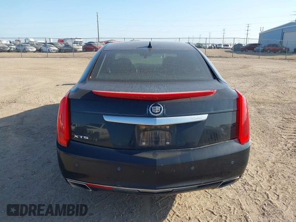 2014 Cadillac XTS Luxury with VIN 2G61M5S35E9228802, listed as a IAAI auction lot 42542501 with 106,506 mi miles and . Bid and sale history available at DreamBid. Image 16.